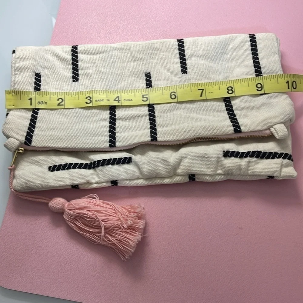 Tribe Alive convertible clutch